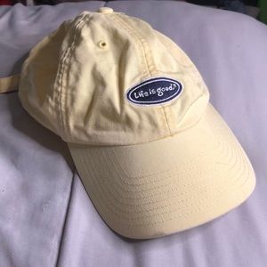 pale yellow baseball cap